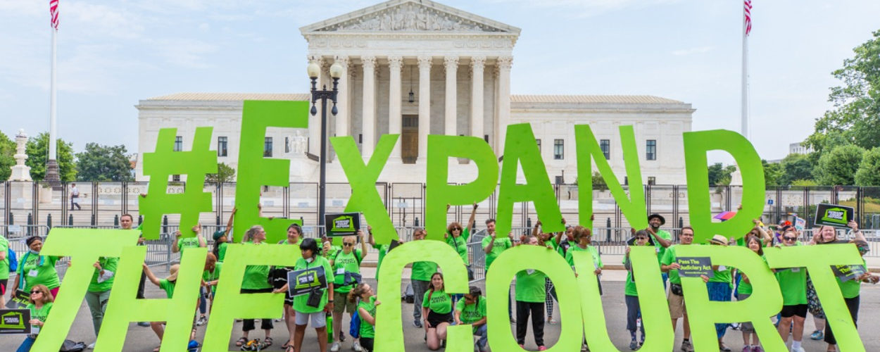 demand justice volunteers outside supreme court
